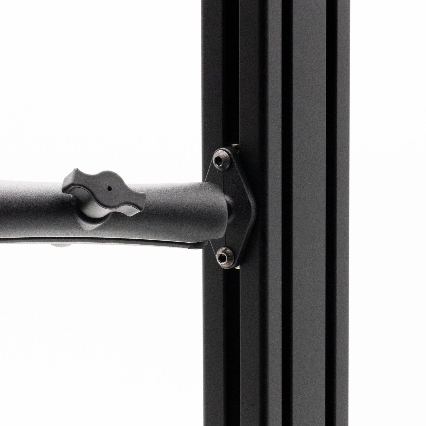 Close-up of a black metal bracket on a white background