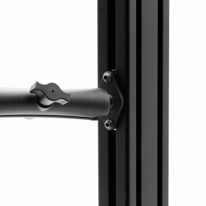 Close-up of a black metal bracket on a white background