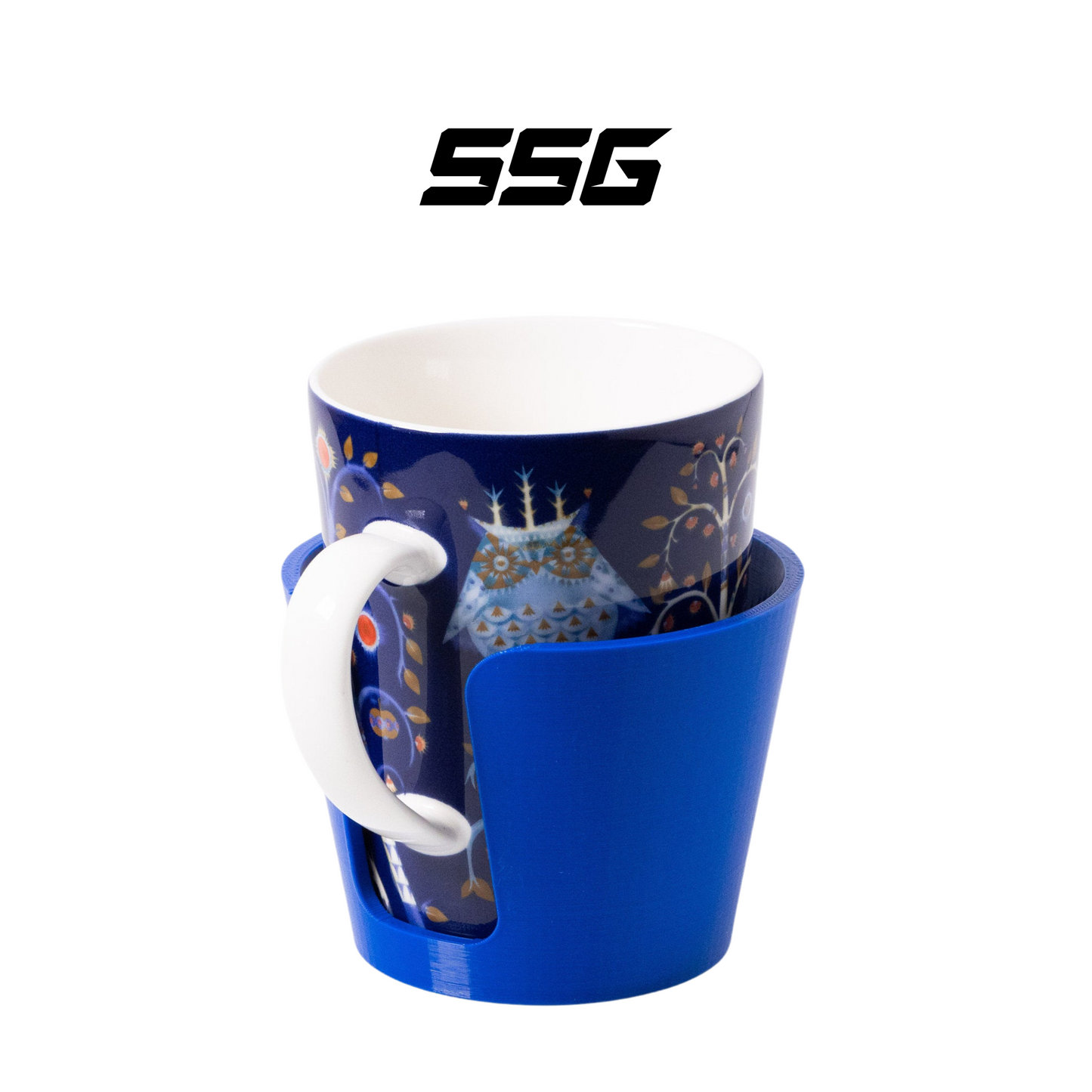 Blue mug with a white handle and decorative interior on a white background, featuring the SSG logo.