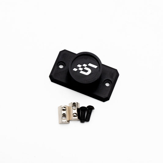 Black metal component with screws on a white background