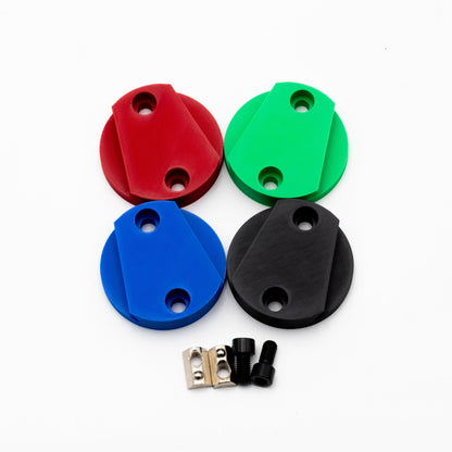 Set of red, green, blue, and black circular components on a white background