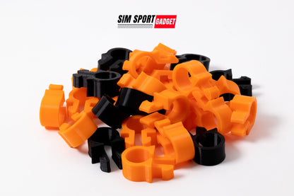 Orange and black plastic clips on a white background with 'SIM Sport Gadget' branding.
