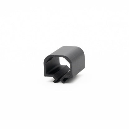 Black rubber grommet on a white background
