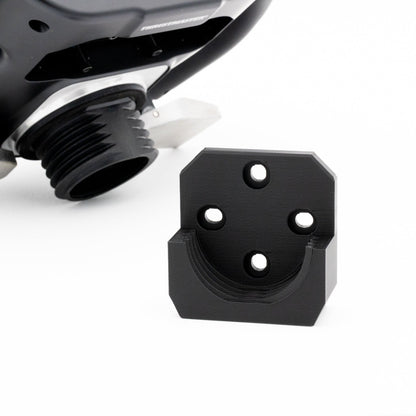 Black metal bracket with three holes on a white background