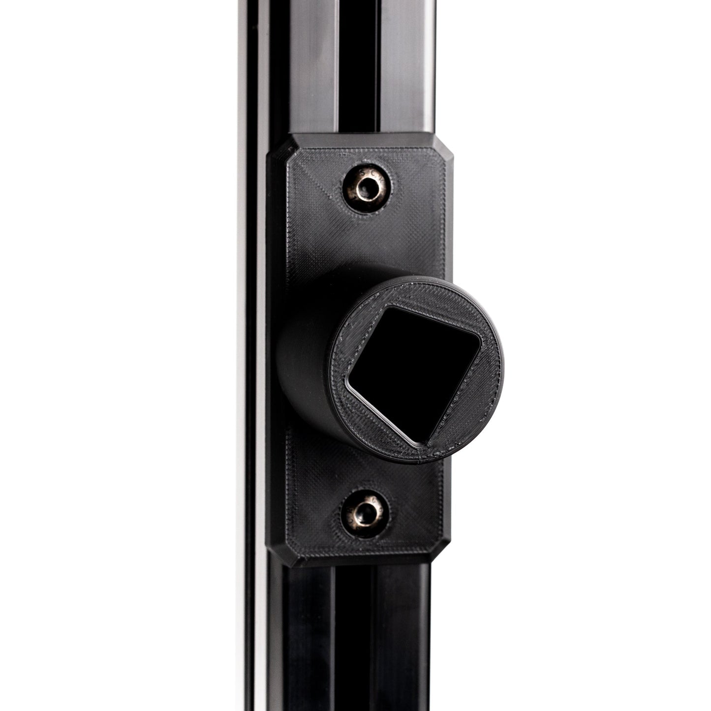 Close-up of a black metal door handle on a white background