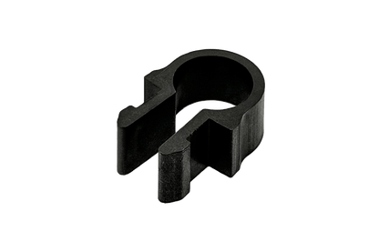 Black metal ring with geometric design on a black background