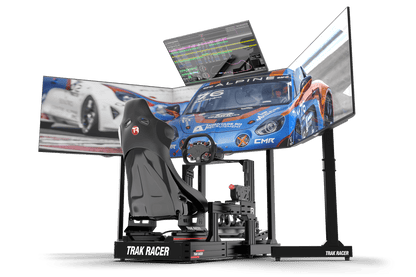 Racing simulator setup with a chair, steering wheel, and multiple screens displaying racing game.