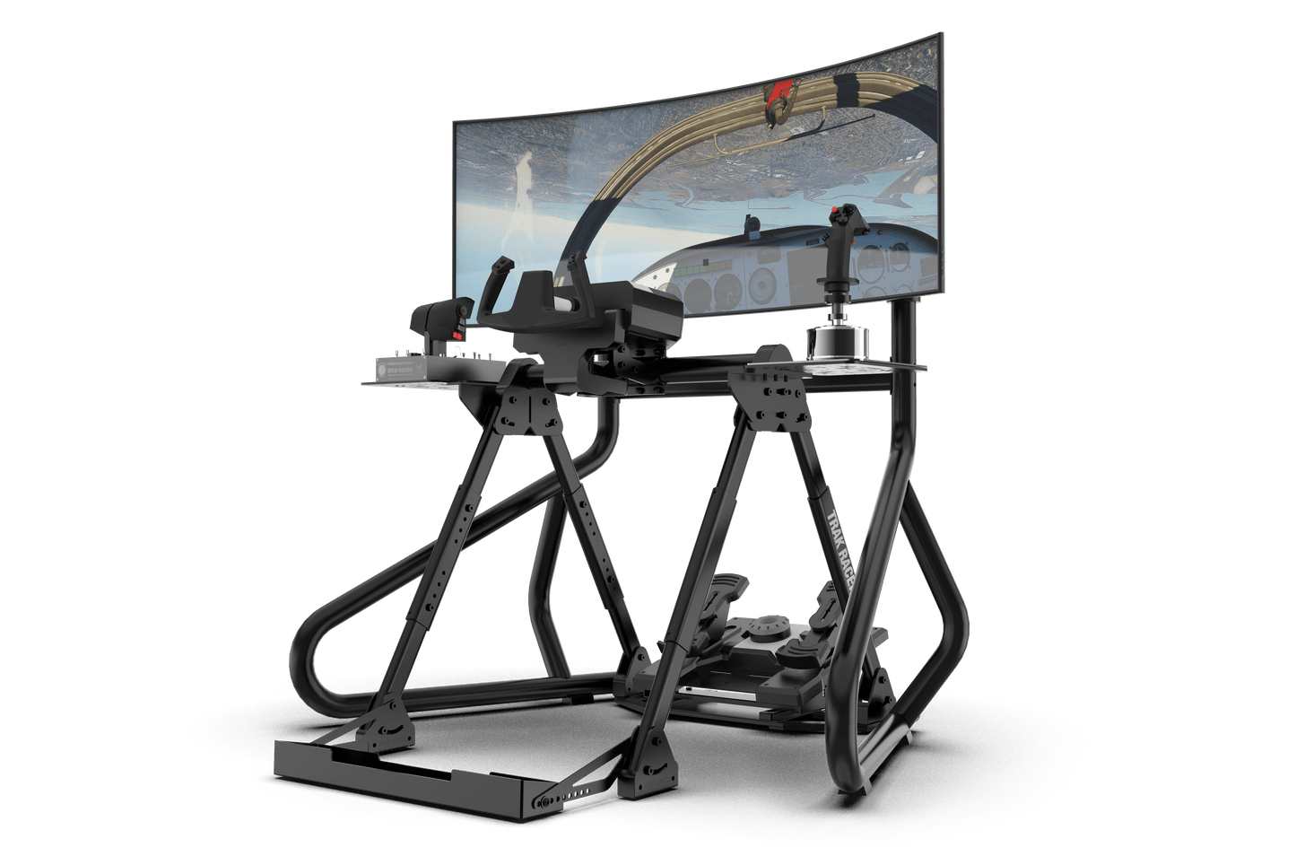 Simulator setup with a monitor displaying a flight simulation game on a green background