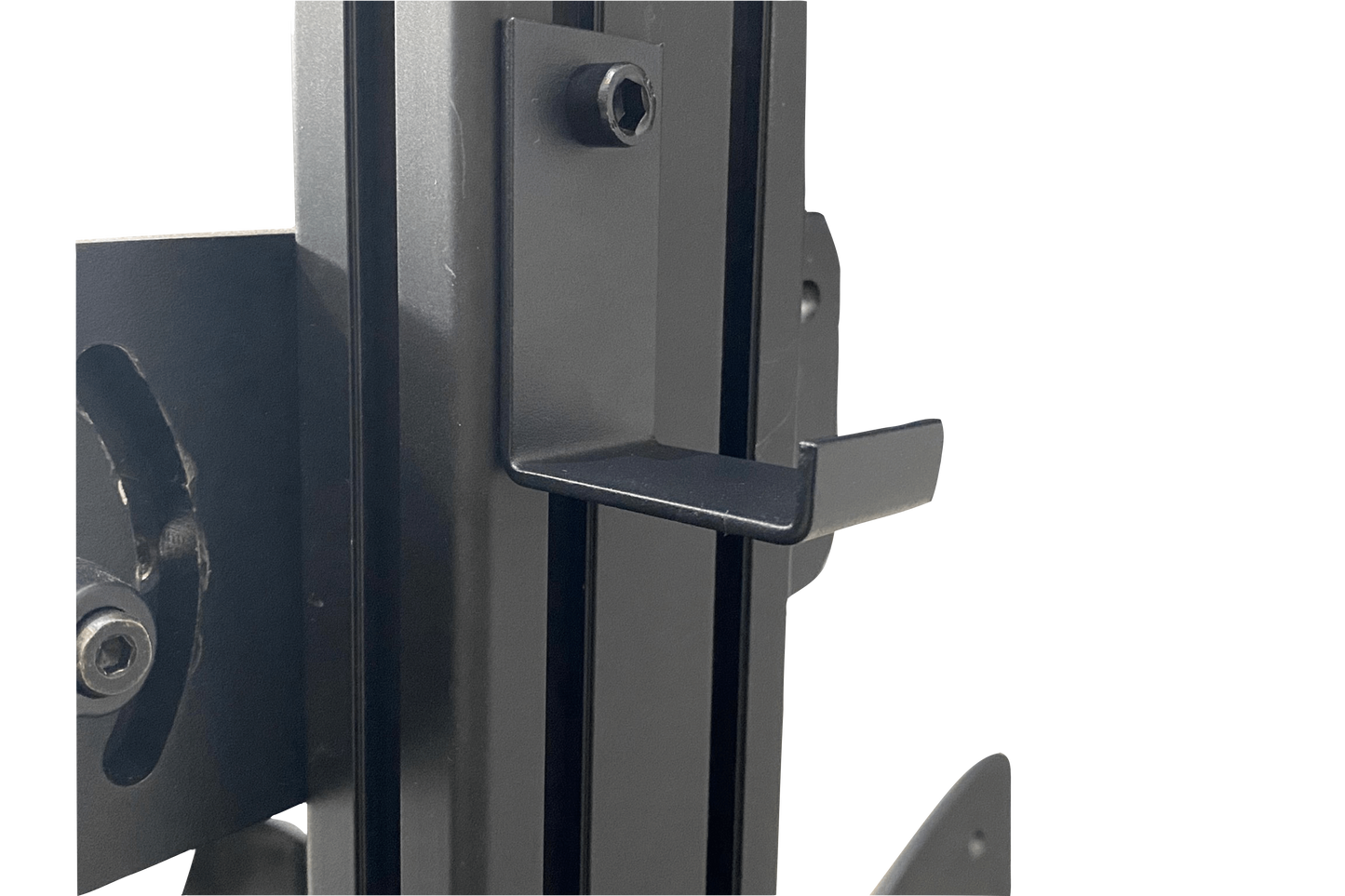 Close-up of a metal bracket attached to a door frame on a white background