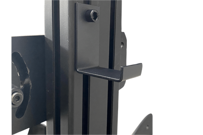 Close-up of a metal bracket attached to a door frame on a white background