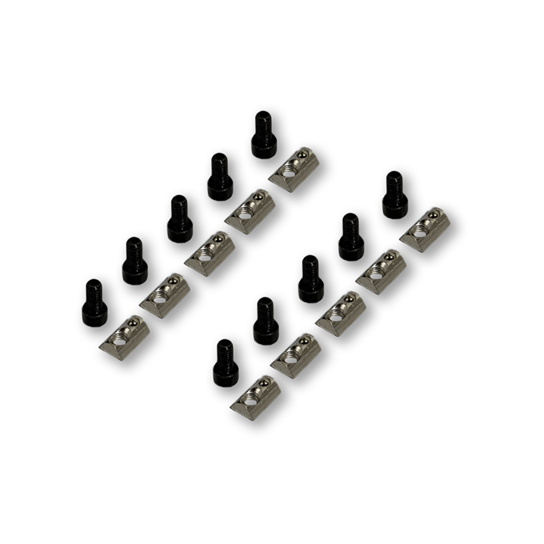 Set of small metal components on a white background