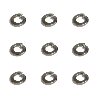 Metal spring clips arranged in a grid on a white background