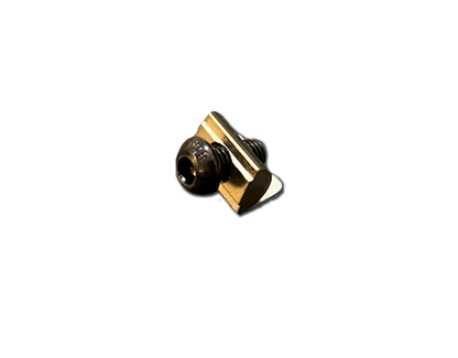 Small black and gold object on a white background