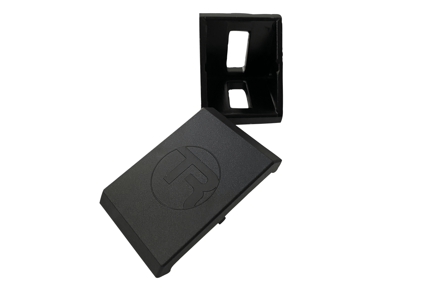 Black rectangular object with a circular logo on a white background