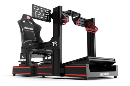Black and red gaming simulator chair with 'Trak Racer' branding on a transparent background