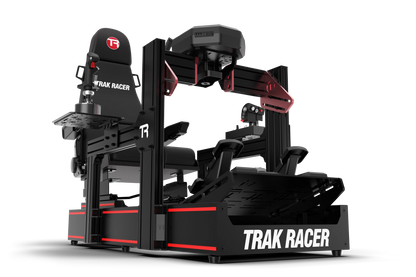 Black and red Trak Racer gaming simulator on a white background