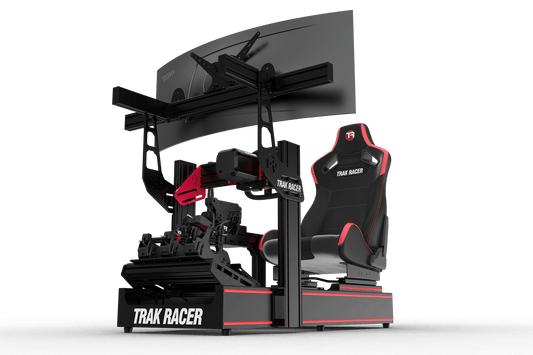 Trak Racer gaming simulator setup with chair and screen on a green background