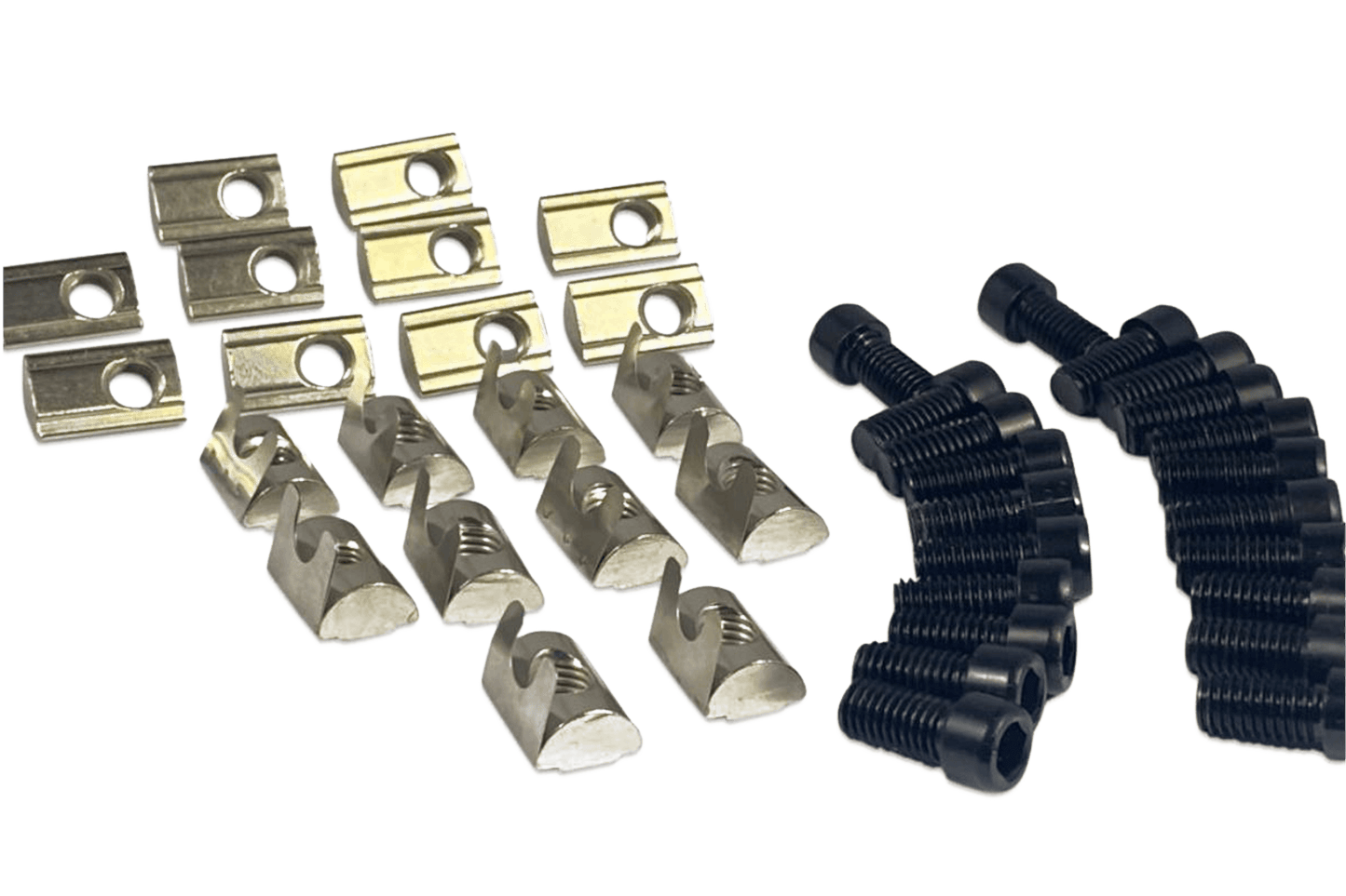 Metal clips and black rubber grommets on a black background