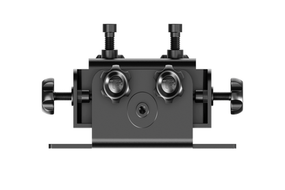 Black metal mechanical component with two cylindrical holes and threaded bolts on a white background