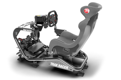 Trak Racer gaming simulator chair and desk setup on a white background