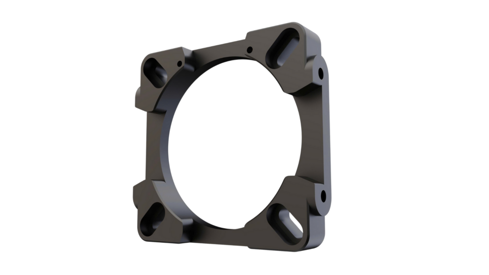 Black metal ring component on a white background