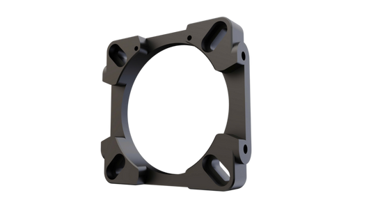 Black metal ring component on a white background