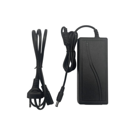 Black power adapter with cables on a white background
