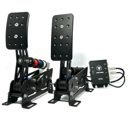 A set of metal racing simulation pedals with adjustable angles and heights, primarily black in color, with visible branding and pedal mechanisms.