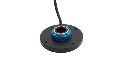 Black circular component with blue center and black cable on a white background