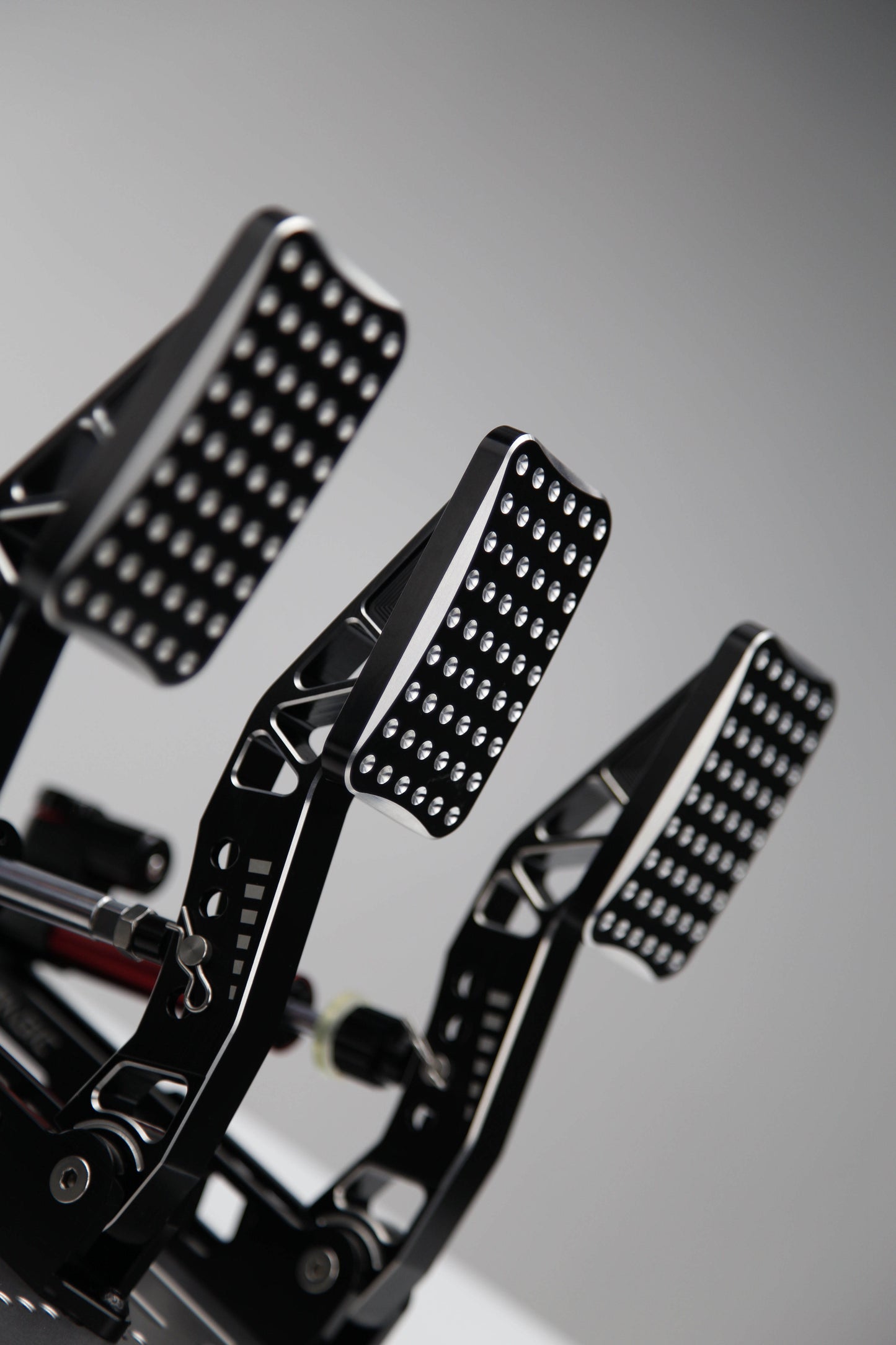 Simagic P2000 sim racing pedals installed in racing setup